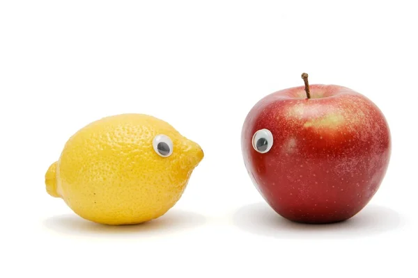 Lustige Zitrone und Apfel mit isolierten Augen — Stockfoto