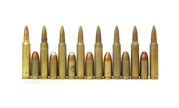 Alternating M16 and 9mm cartridges — Stock Photo, Image