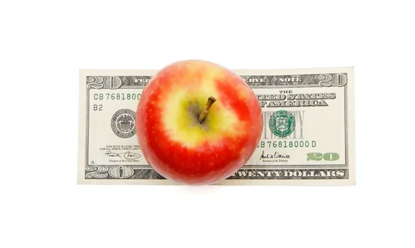 Yirmi dolar banknotunun üzerinde taze elma — Stok fotoğraf