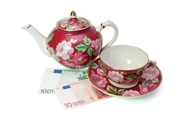 Tea service on euro banknotes — Stock Photo, Image