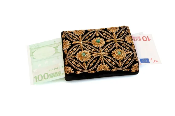 Embroidered purse with euro money — Stock Photo, Image