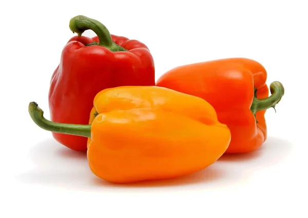 Three sweet bell peppers isolated — Stock Photo, Image
