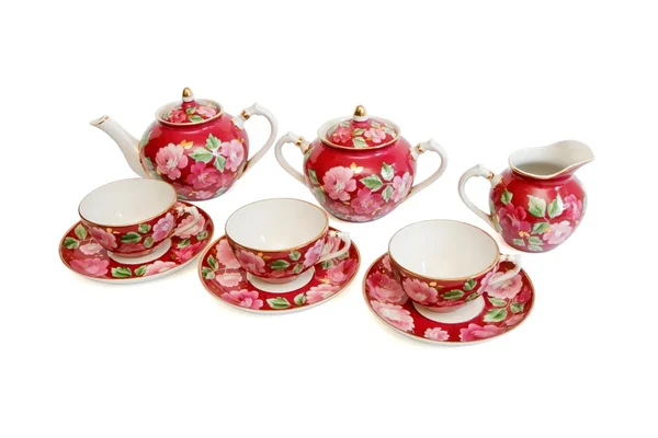 Serviço de chá vermelho bonito isolado — Fotografia de Stock