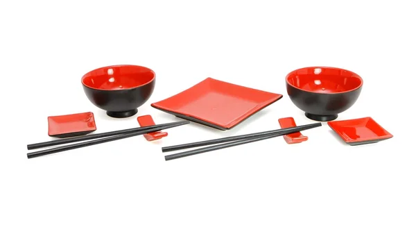 Japanese red and black sushi service — стокове фото