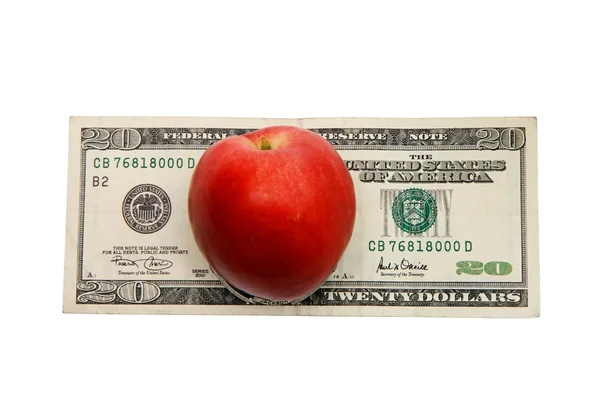 Fresh nectarine peach on dollar bill — Stock Photo, Image