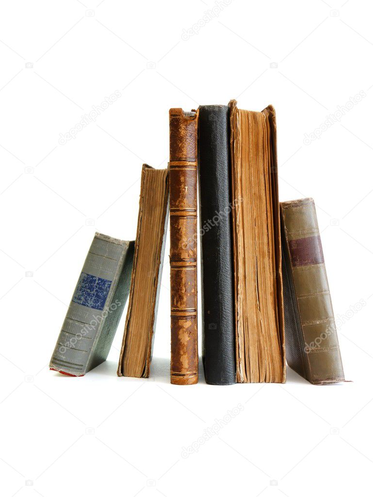 Stack of old books standing isolated