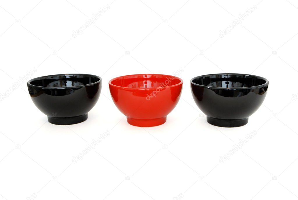 Row of 2 black and 1red porcelain bowls