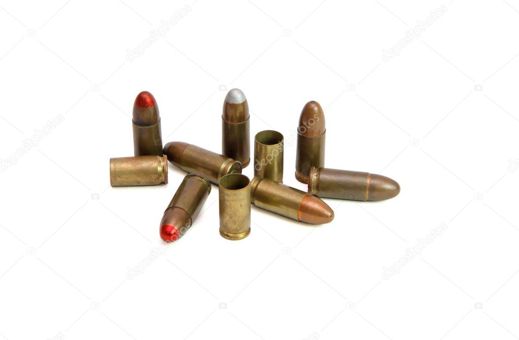 Pile of 9mm cartridges and spent cases