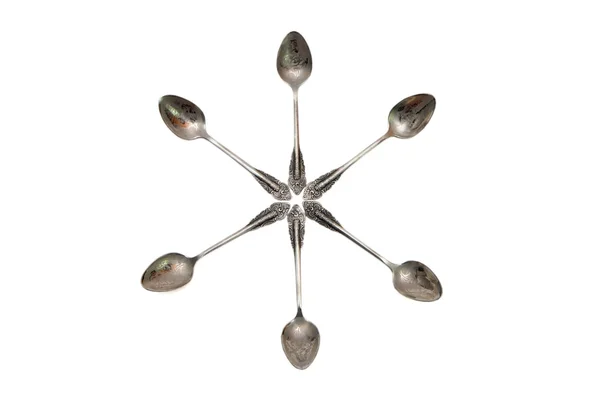 Gümüş kaşık yapılmış altı köşeli yıldız — Stok fotoğraf