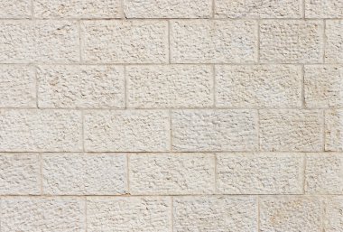 Beige rough stone wall texture clipart