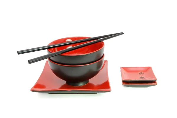 Conjunto de mesa oriental roja y negra aislada — Foto de Stock
