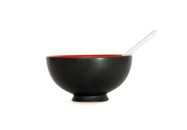 Cuenco oriental negro con cuchara blanca — Foto de Stock