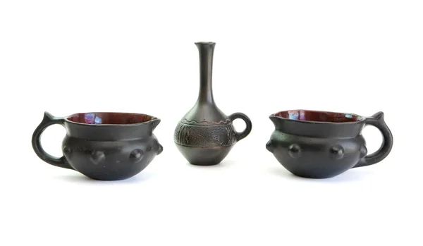 Due pentole in ceramica nera e una piccola brocca — Foto Stock