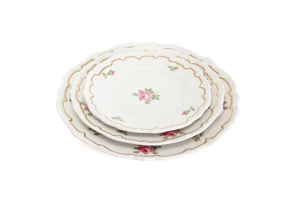 Stack of vintage plates and saucers — Stock Photo, Image