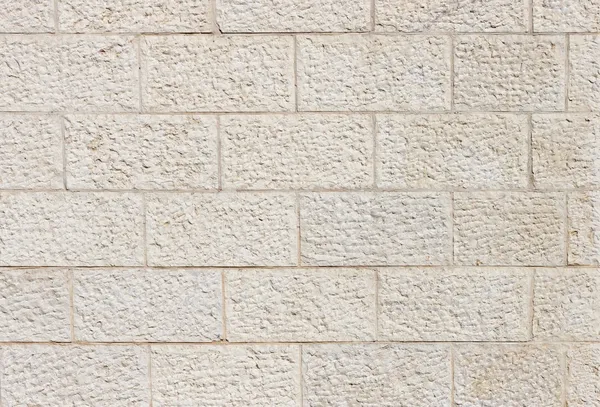 Beige rough stone wall texture — Stock Photo, Image