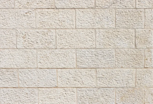 Bege textura de parede de pedra áspera Imagens Royalty-Free