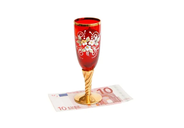 Beau verre de vin rouge sur billet d'euro — Photo