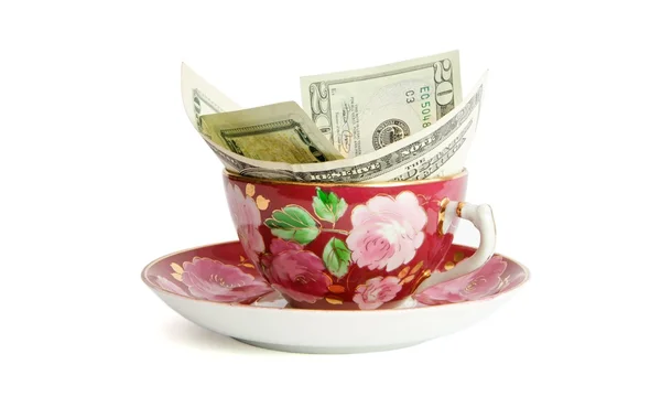 Šálek čaje s dvacet dolarové bankovky — Stockfoto