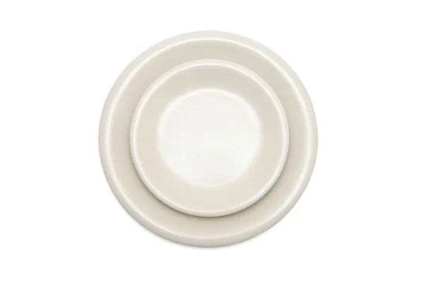 Obyčejné béžové talíř a talířek — Stock fotografie