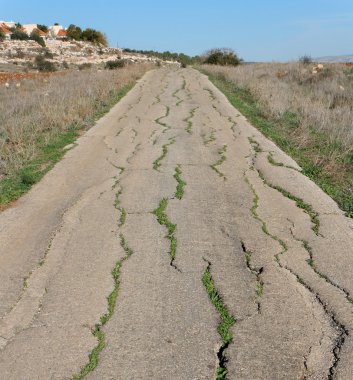 Old cracked countryside road clipart