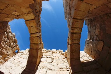 Sky in holes of roof of ancient house clipart