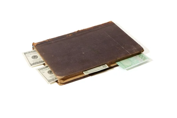 Old book with money bookmarks isolated — Stock Photo, Image