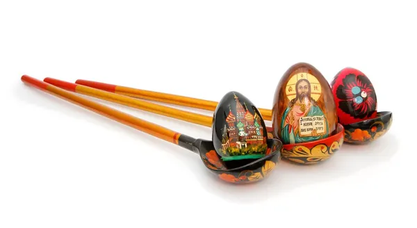 Easter eggs in Russian wooden spoons — Stock Photo, Image