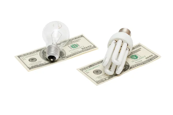Energia economizar lâmpada vs lâmpada em notas de dólar Imagem De Stock