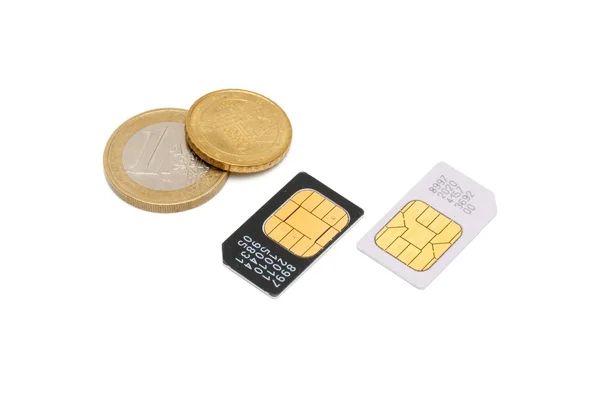 SIM-карты для мобильных телефонов и евро — стоковое фото