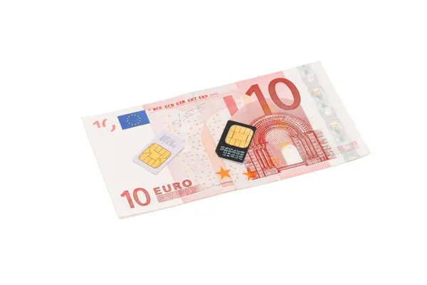 SIM cards for cell phones on euro bill — Stock Photo, Image