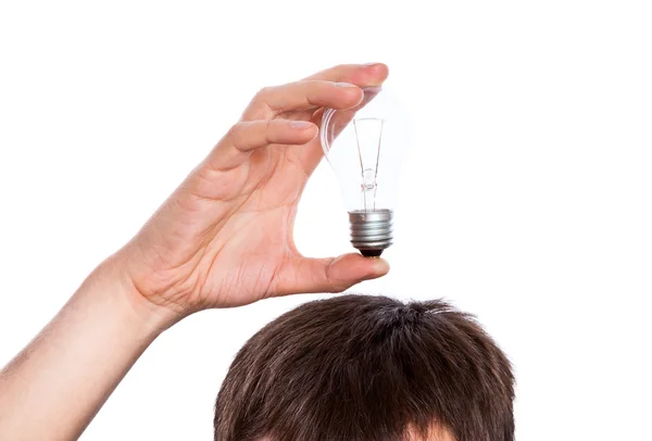 Lamp in hand under man — Stock Photo, Image