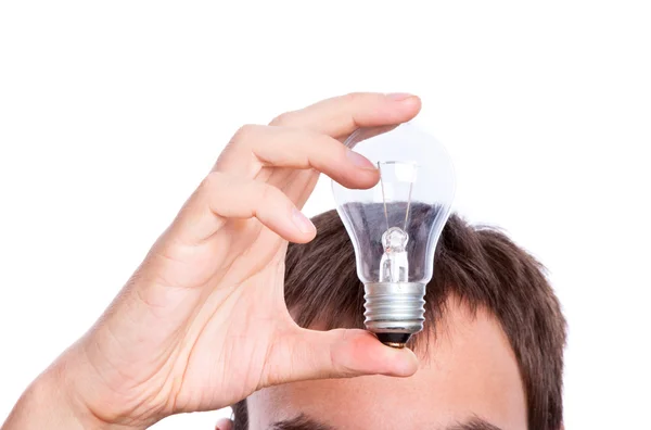 Lamp in hand under man — Stock Photo, Image