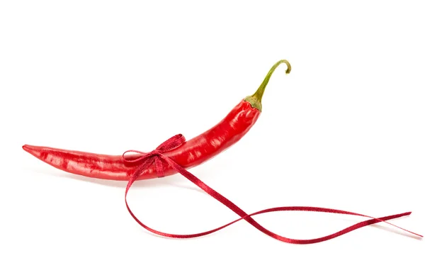 Czerwona papryczka chili z taśmy — Zdjęcie stockowe
