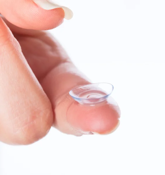 Contact lens on finger — Stock Photo, Image