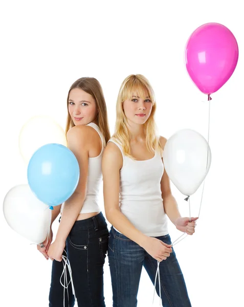 Meisje met ballons springen — Stockfoto