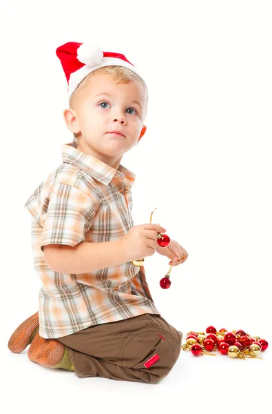 Liten pojke bär en Tomtemössa och SP — Stockfoto