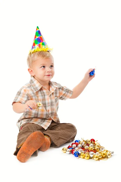 Little boy playing with baubles — Stock Photo, Image