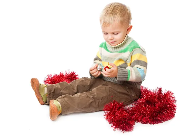 Little boy and tinsel — Stock Photo, Image