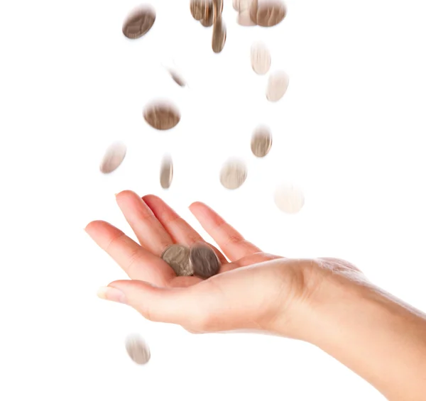 Coins falling in hand — Stock Photo, Image