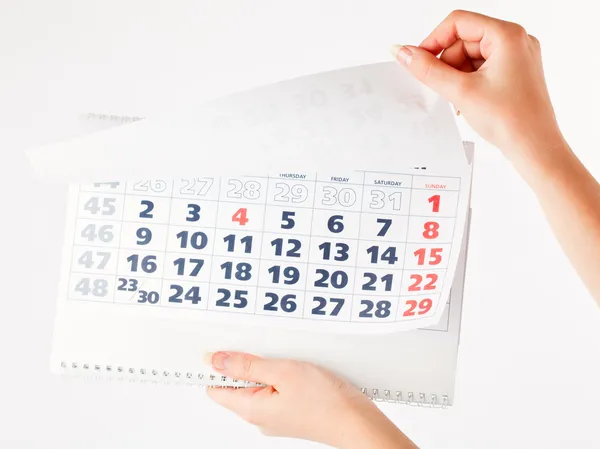 Close up of calendar in hands — Stock Photo, Image