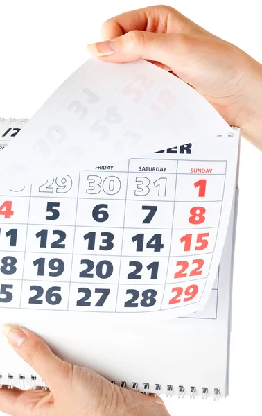 Närbild på kalendern i händer — Stockfoto