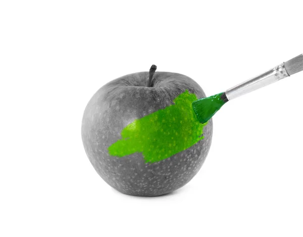 Green apple and brush — Stock Photo, Image