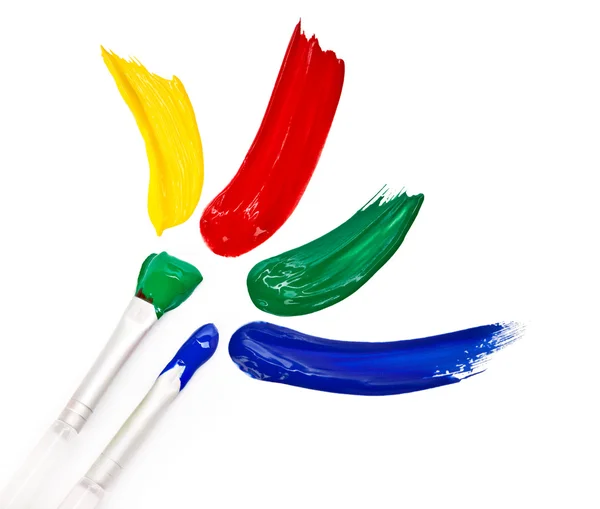 Four brush strokes and two brushes — Stock Photo, Image