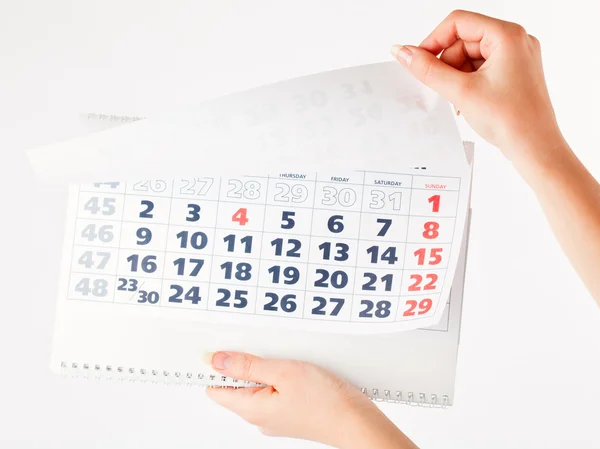 Close up of calendar in hands — Stock Photo, Image
