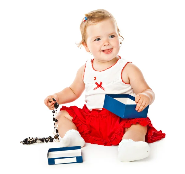 Маленька дівчинка грає на підлозі — стокове фото