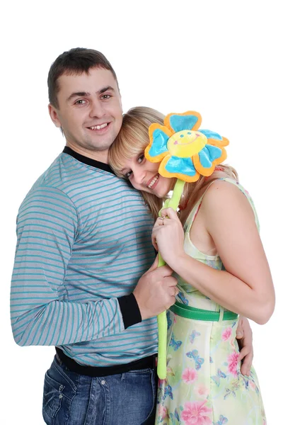 Jonge paar met een bloem — Stockfoto