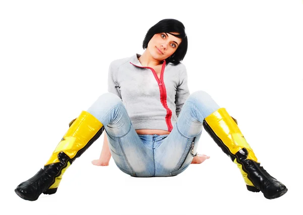 Frau sitzt auf dem Boden — Stockfoto