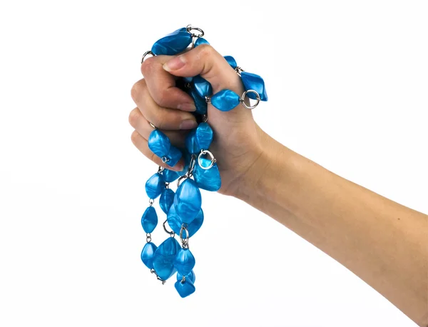 Hand with a blue beads — Stock Photo, Image
