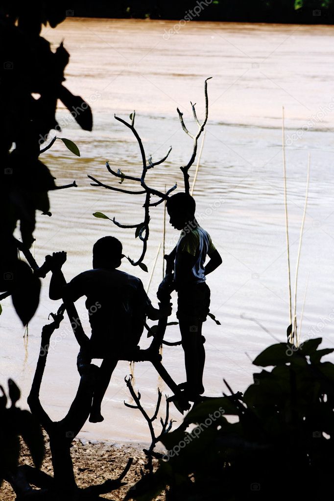 Boys playing at Mekong river