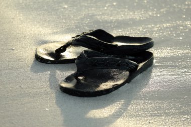 Flip flops on the beach clipart